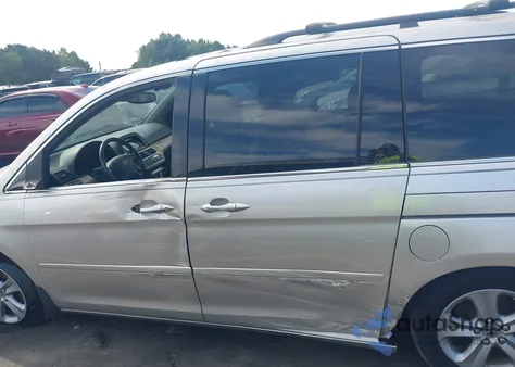 2009 Honda Odyssey Touring z USA, uszkodzony, nr VIN 5FNRL38989B011507